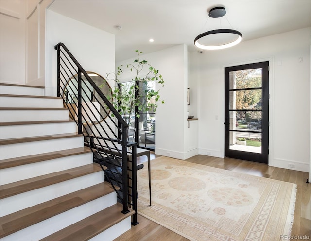 entryway with light hardwood / wood-style floors