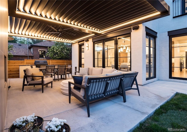 view of patio / terrace with an outdoor living space and grilling area