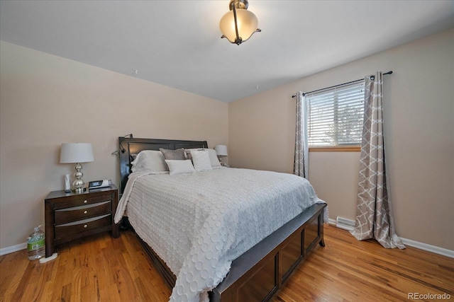 bedroom with light hardwood / wood-style floors