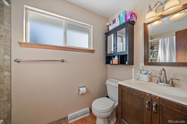 bathroom with vanity, toilet, curtained shower, and tile patterned flooring