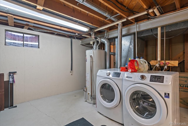 laundry room featuring independent washer and dryer and water heater