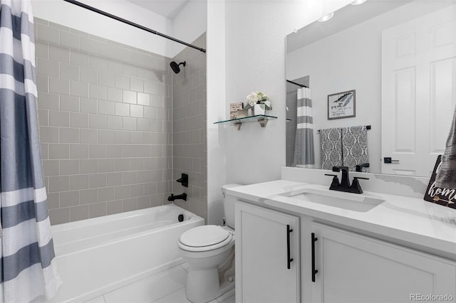 full bathroom featuring shower / bath combination with curtain, vanity, tile patterned flooring, and toilet