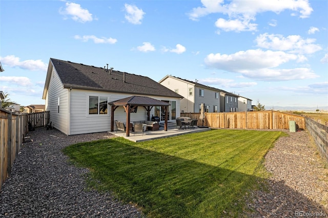 back of house with an outdoor hangout area, a gazebo, a lawn, and a patio