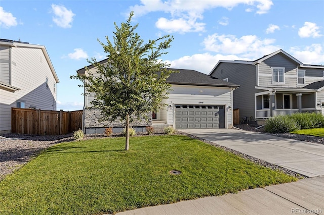 view of front facade featuring a garage and a front lawn