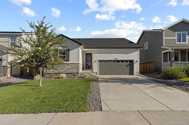 27491 E 10th Dr, Aurora, CO 80018 - view of front of house with an attached garage, driveway, and stone siding