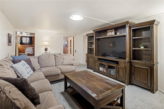 living area with light colored carpet