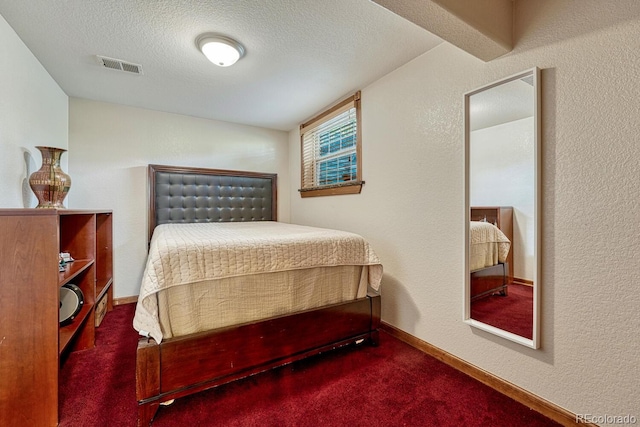 5173 S Emporia Way, Greenwood Village, CO 80111 - carpeted bedroom featuring a textured wall and a textured ceiling