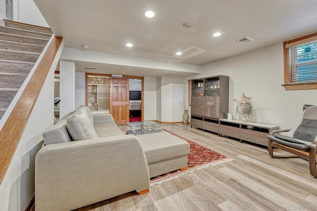 5173 S Emporia Way, Greenwood Village, CO 80111 - living room featuring wood finished floors, recessed lighting, and stairway