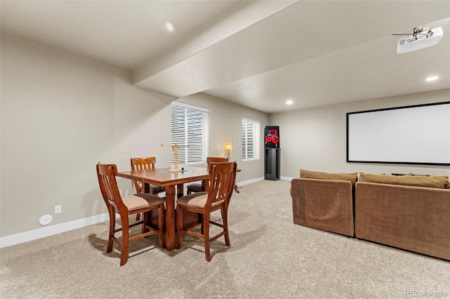 home theater featuring light colored carpet