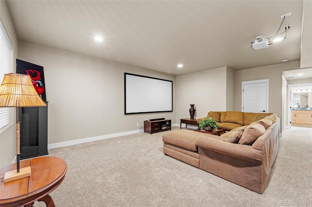 home theater with light carpet