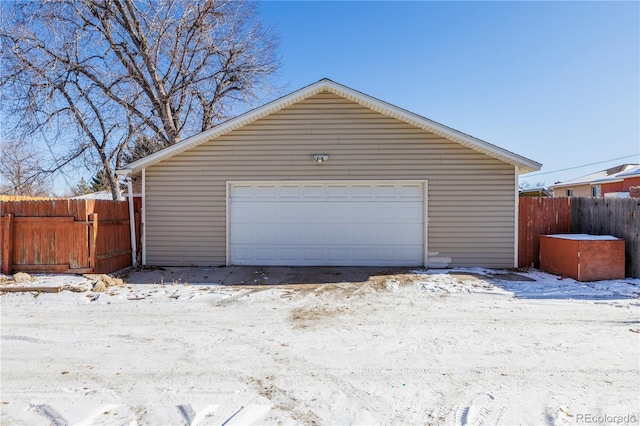 view of snow covered garage