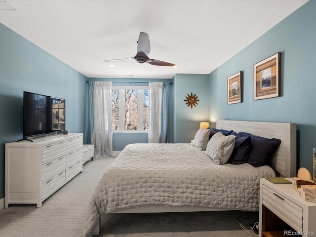 carpeted bedroom featuring ceiling fan