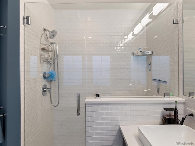 bathroom featuring an enclosed shower