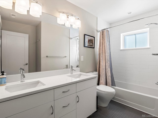 full bathroom with vanity, shower / bath combo with shower curtain, and toilet