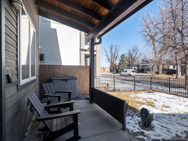 view of snow covered patio