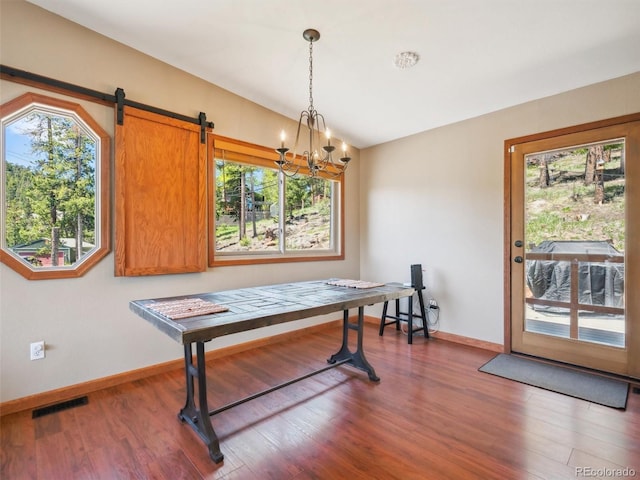 34075 Grouse Ln, Evergreen, CO 80439 - dining space with a chandelier, plenty of natural light, and baseboards