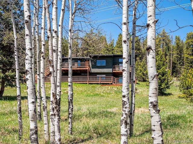 34075 Grouse Ln, Evergreen, CO 80439 - view of front of home featuring a wooden deck