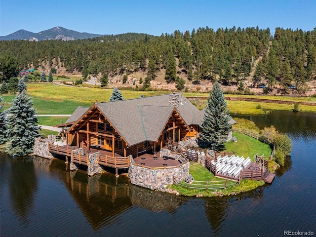 34075 Grouse Ln, Evergreen, CO 80439 - view from above of property with a heavily wooded area and a water and mountain view
