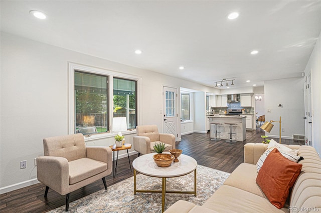 13701 Yank Way, Arvada, CO 80004 - living area with dark wood-type flooring and recessed lighting