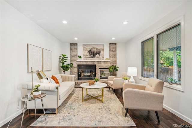 13701 Yank Way, Arvada, CO 80004 - living area with dark wood-style floors, recessed lighting, and a fireplace