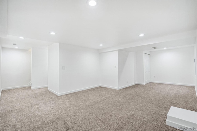 13701 Yank Way, Arvada, CO 80004 - finished below grade area featuring light carpet and recessed lighting