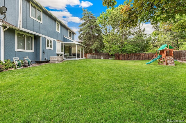 13701 Yank Way, Arvada, CO 80004 - fenced backyard featuring a playground
