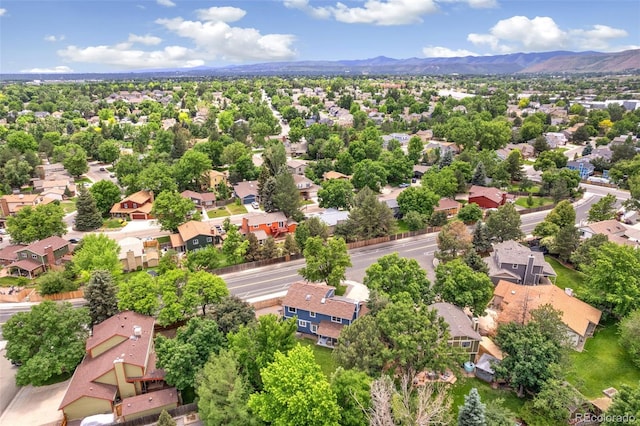 13701 Yank Way, Arvada, CO 80004 - aerial perspective of suburban area with mountains