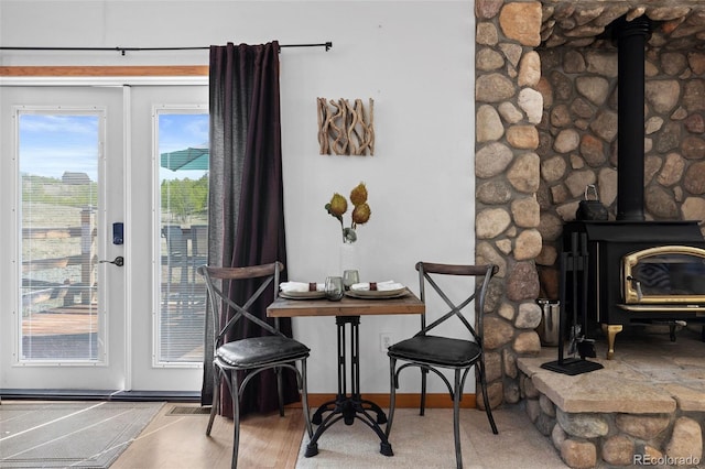 7551 Remington Rd, Como, CO 80432 - dining area with a wood stove and baseboards
