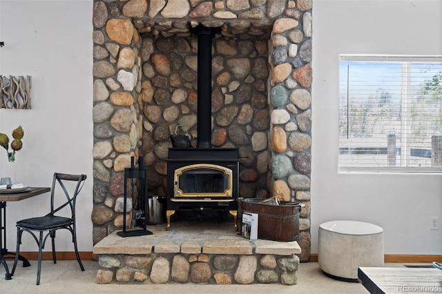 7551 Remington Rd, Como, CO 80432 - detailed view of baseboards and a wood stove