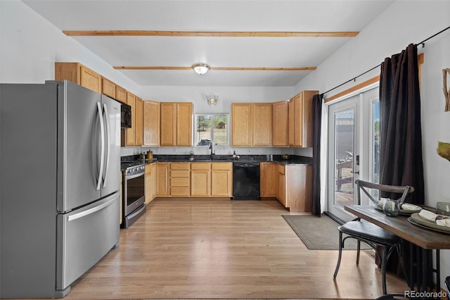 7551 Remington Rd, Como, CO 80432 - kitchen featuring black appliances, dark countertops, and light wood finished floors