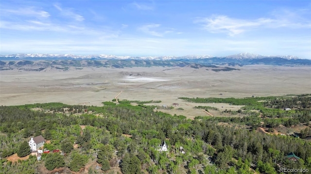 7551 Remington Rd, Como, CO 80432 - aerial view of property and surrounding area featuring a mountainous background