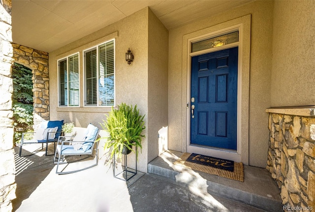4968 Montvale Dr, Highlands Ranch, CO 80130 - entrance to property featuring stucco siding and covered porch