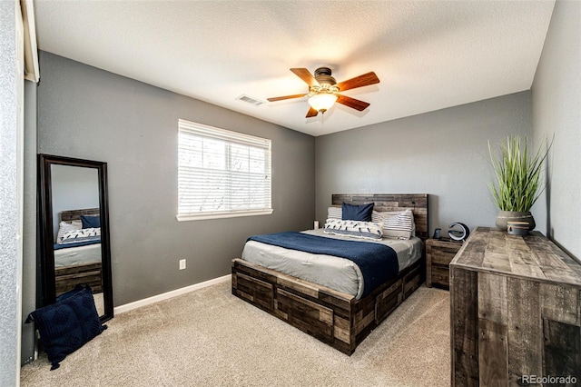 4968 Montvale Dr, Highlands Ranch, CO 80130 - bedroom featuring visible vents, baseboards, a ceiling fan, and light colored carpet