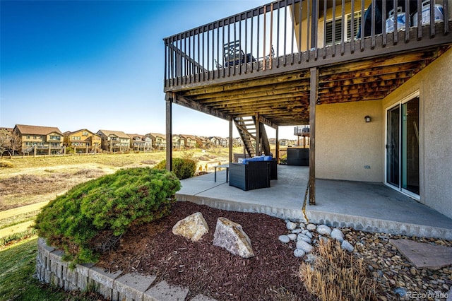4968 Montvale Dr, Highlands Ranch, CO 80130 - view of patio featuring stairway, a deck, and a residential view