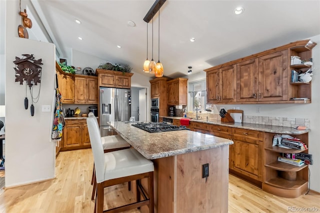 kitchen featuring open shelves, stainless steel appliances, brown cabinets, light wood finished floors, and lofted ceiling