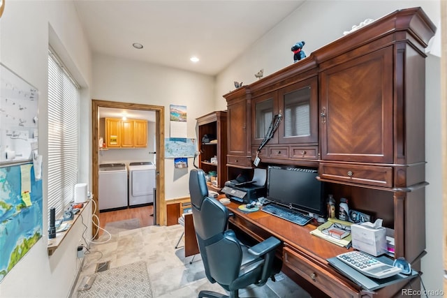 home office featuring washing machine and dryer, recessed lighting, and light wood finished floors