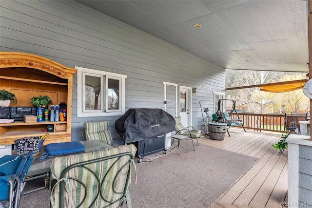 wooden deck with area for grilling
