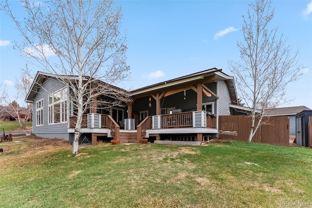510 Park View Ln, Gypsum, CO 81637 - rear view of house with a lawn, a wooden deck, and a shed