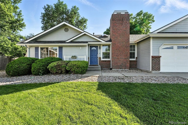 5193 S Flanders Ln, Centennial, CO 80015 - single story home featuring a chimney, a front lawn, an attached garage, and brick siding