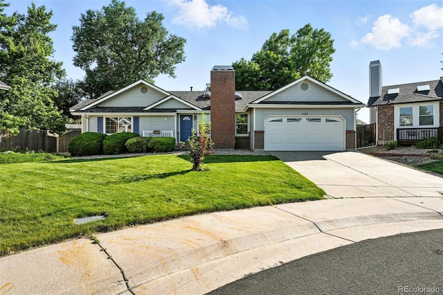 5193 S Flanders Ln, Centennial, CO 80015 - view of front of house with brick siding, an attached garage, driveway, a chimney, and a shingled roof