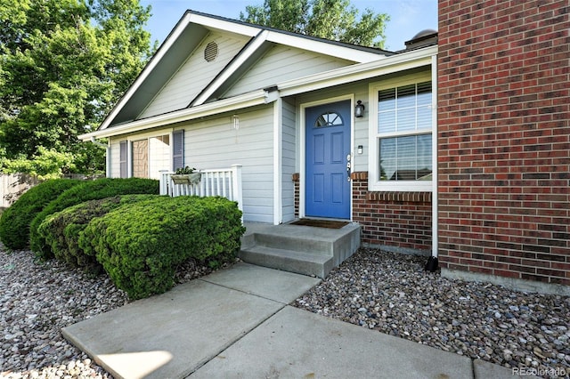 5193 S Flanders Ln, Centennial, CO 80015 - view of exterior entry with brick siding