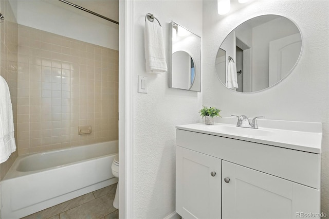 5193 S Flanders Ln, Centennial, CO 80015 - bathroom with vanity, tile patterned flooring, shower / bathtub combination, and a textured wall