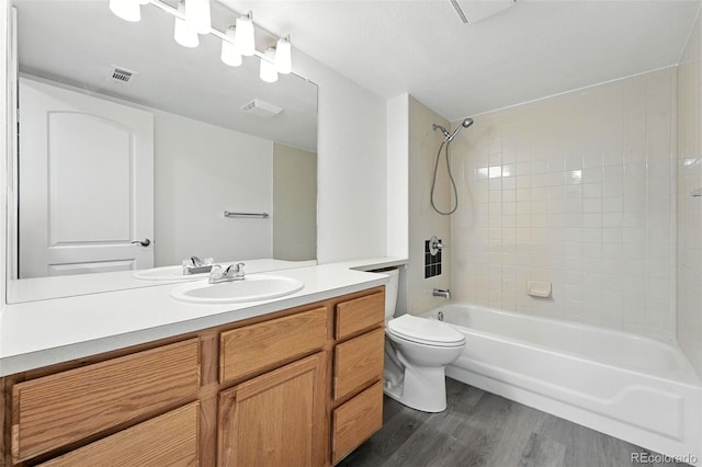 5193 S Flanders Ln, Centennial, CO 80015 - full bath featuring wood finished floors,  shower combination, and vanity