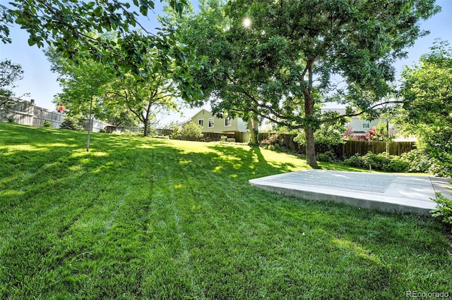 5193 S Flanders Ln, Centennial, CO 80015 - fenced backyard featuring a patio
