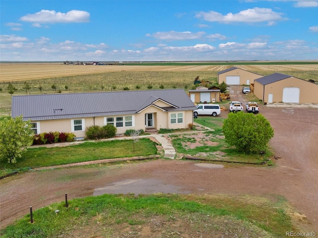 47855 E 88th Ave, Bennett, CO 80102 - ranch-style home with a view of countryside, metal roof, and a front lawn
