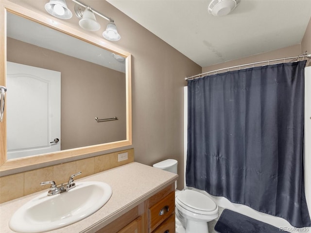 47855 E 88th Ave, Bennett, CO 80102 - full bath featuring tasteful backsplash, vanity, toilet, and curtained shower