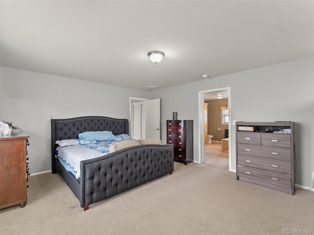 47855 E 88th Ave, Bennett, CO 80102 - bedroom with light colored carpet, baseboards, and connected bathroom