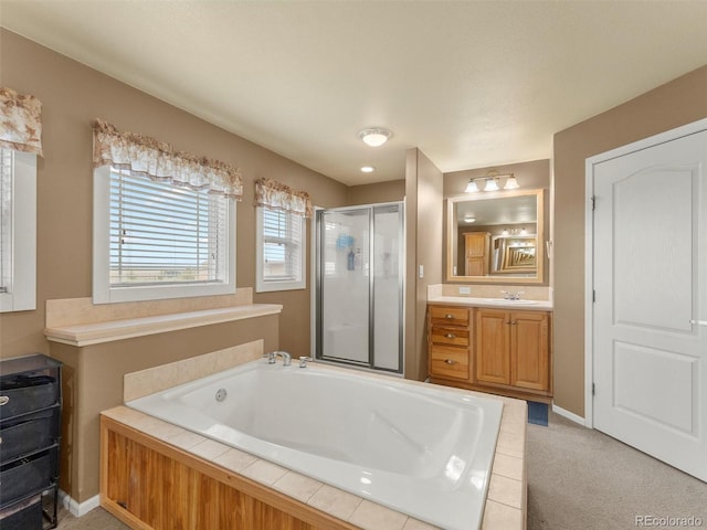 47855 E 88th Ave, Bennett, CO 80102 - bathroom with a stall shower, a garden tub, vanity, and baseboards