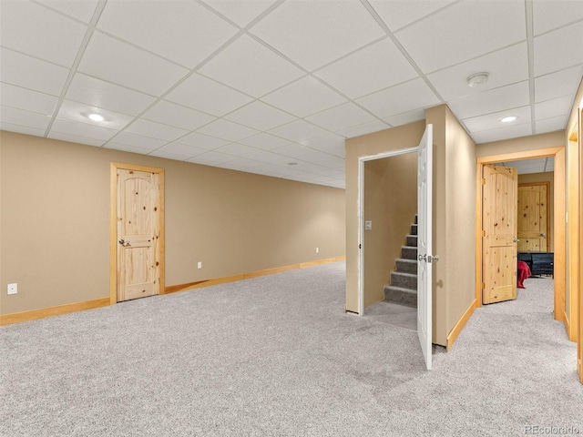 47855 E 88th Ave, Bennett, CO 80102 - finished below grade area with stairs, carpet flooring, a drop ceiling, baseboards, and recessed lighting