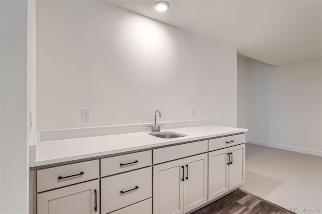 bathroom featuring vanity and hardwood / wood-style floors